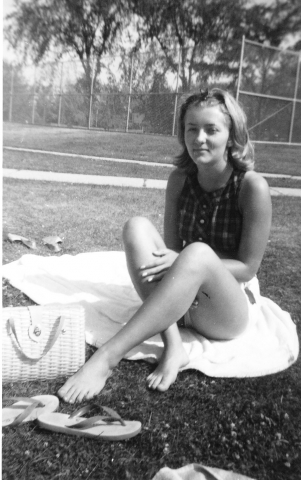 Barb Larson sun bathing 1964